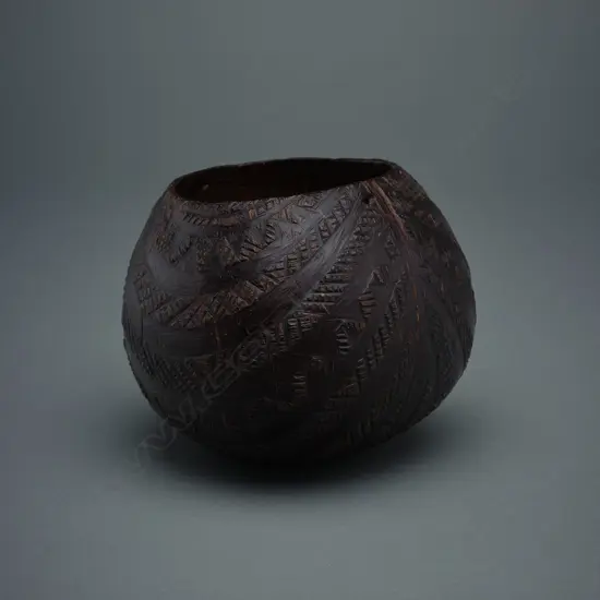 A late 19thC carved coconut shell - Cook Islands,